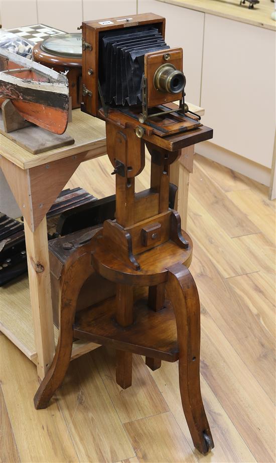 A 1896 instantograph camera and stand, Lancaster and Sons lens. H.116cm.